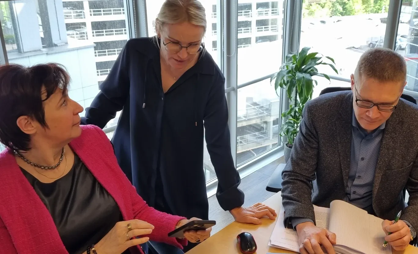 Three people working in the office 
