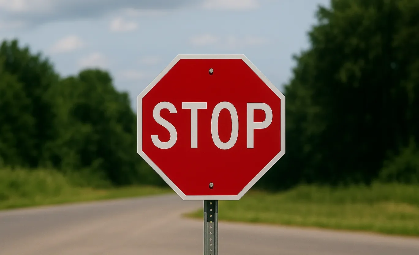 Stop sign on a rural road 